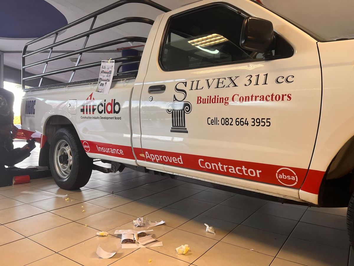 White bakkie with Silvex 311 building contractors vinyl branding